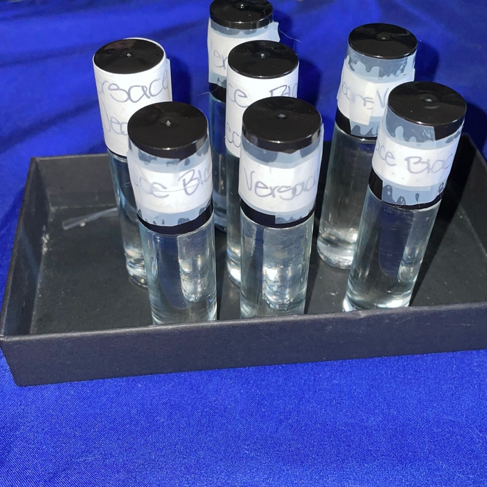 Versace (Black Jean 1.3 oz Roller-Ball Men fragrance oil)